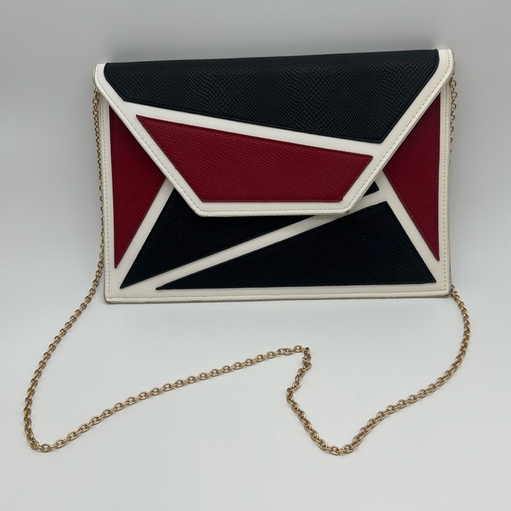 Color block faux leather red white and black purse 8 x tall 12 in tall. Not wide